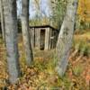 Typical early Alaskan outhouse.