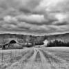 Scenic winding gravel lane-
through Northern Arkansas's
Ozark Hills.