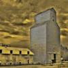 Small town-old style metal grain elevator-near Spiritwood, SK~