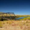 Another view of the metal-framed bridge over the Trinchera River.