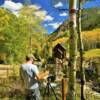 Artist painting 
'in progress'
of the historic
Crystal Mill.