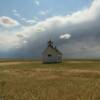 Some rumbling afternoon clouds rolling up on the ornate
1913 Abbott Chapel in
eastern Colorado.