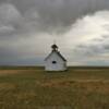 Frontal view of the rolling 
June clouds over this old relic.