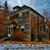 'Grown over' early 20th century farm residence-near Granville, Iowa