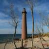 A peek through the shore brush at the
Little Sable Point Lighthouse.