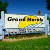 "Welcome To Grand Marais"  sign.
