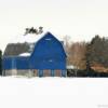 An October snow at this
unique blue barn near
Northfield, Minnesota.