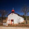 This hidden little church is located just east of Santa Fe along 
Interstate 25.