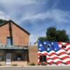 Beautifully painted US flag 
on a building wall in
Corona, New Mexico.