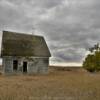 Eerie ominous abandoned
1890's farm stead.
Clark County, SD.