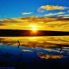 Spectacular reflective sunset-near Elm Springs, South Dakota