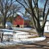 Picturesque old farm scene
following an autumn snowfall.
