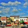 Monroe, Wisconsin.
'An arrey' of colorful downtown building fronts~